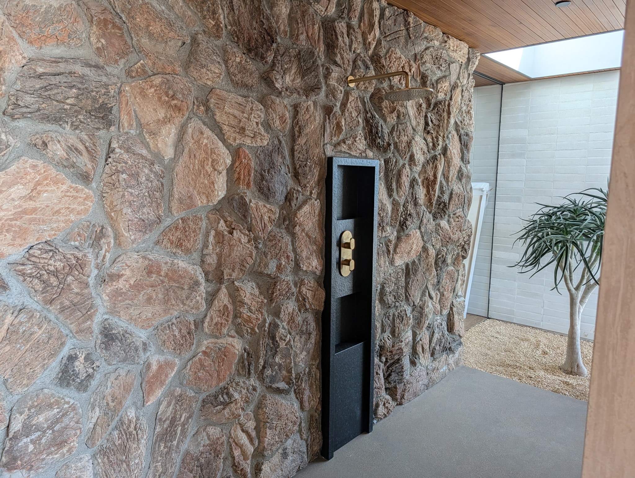Baja Drift thin veneer — Malibu outdoor shower stone wall detail